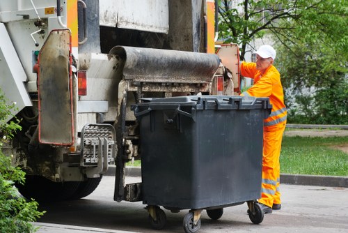 Construction debris being loaded for removal by Havering muck away services