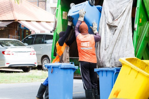 Community members participating in waste disposal event
